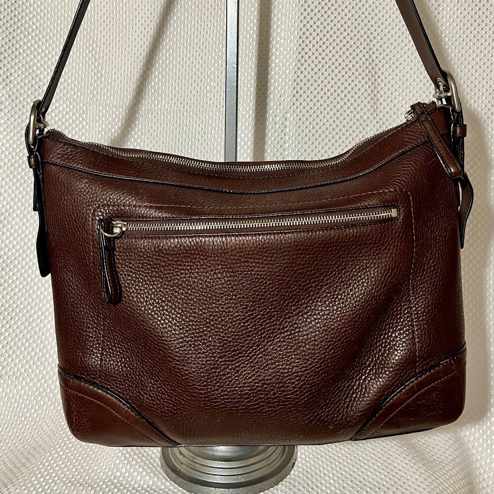 Coach Brown Shoulder Bag with Slouchy Hobo Style and Adjustable Strap.